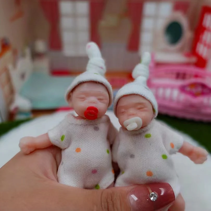 8cm Cute Mini Silicone Bebe Reborn Girl With 2 Sets Mini Outfits for Each Reborn Baby Girl Soft Touching Feeling