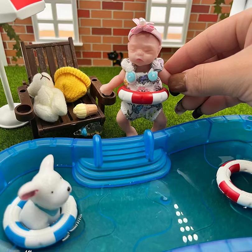 8cm Cute Mini Silicone Bebe Reborn Girl With 2 Sets Mini Outfits for Each Reborn Baby Girl Soft Touching Feeling