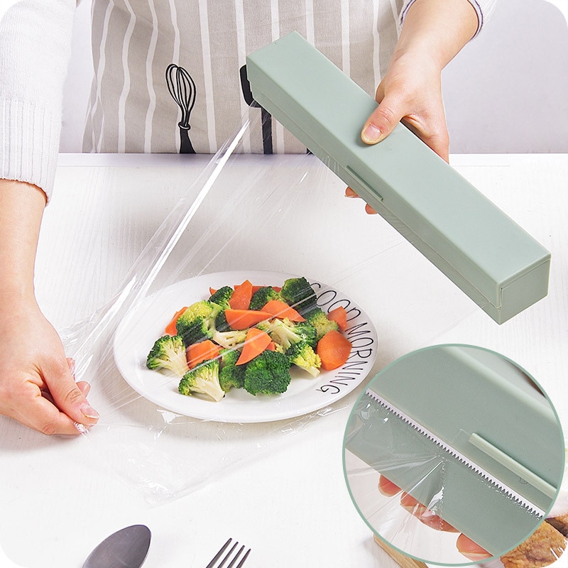 Clear Food Wrap Dispenser and Cutter Clear Food Wrap Dispenser and Cutter