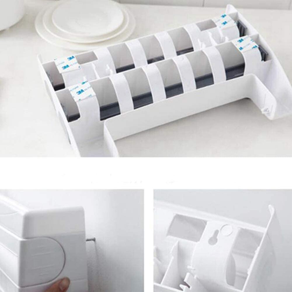 Foil and Plastic Wrap Dispenser with Cutter Foil and Plastic Wrap Dispenser with Cutter