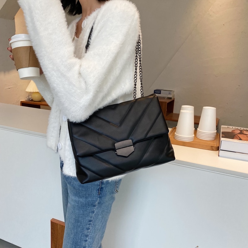 Ladies Leather Sling Bag with Chain Strap Ladies Leather Sling Bag with Chain Strap