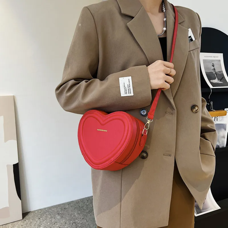 Leather Heart Shaped Sling Bag