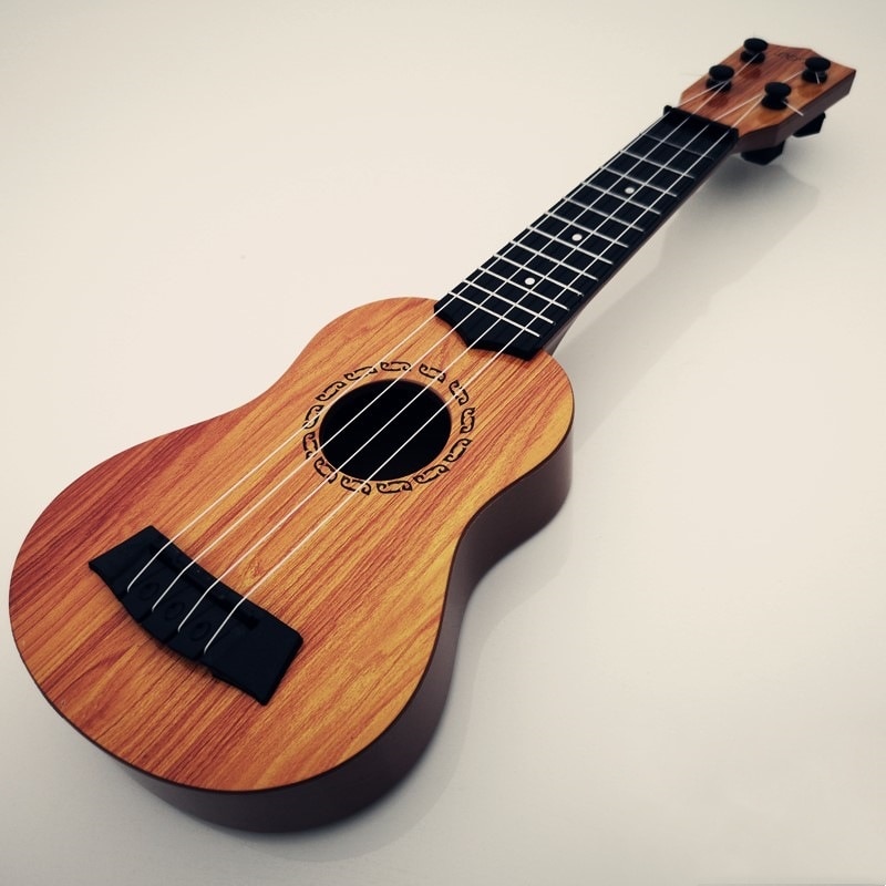 Mini Guitar 4 Strings Classical Ukulele Guitar Toy Musical Instruments For Kids Beginners Early Education Ukulele Mini Guitar 4 Strings Classical Ukulele Guitar Toy Musical Instruments For Kids Beginners Early Education Ukulele