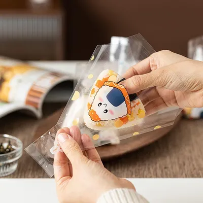 Onigiri Plastic Wrapper with Design (50 pcs) Onigiri Plastic Wrapper with Design (50 pcs)