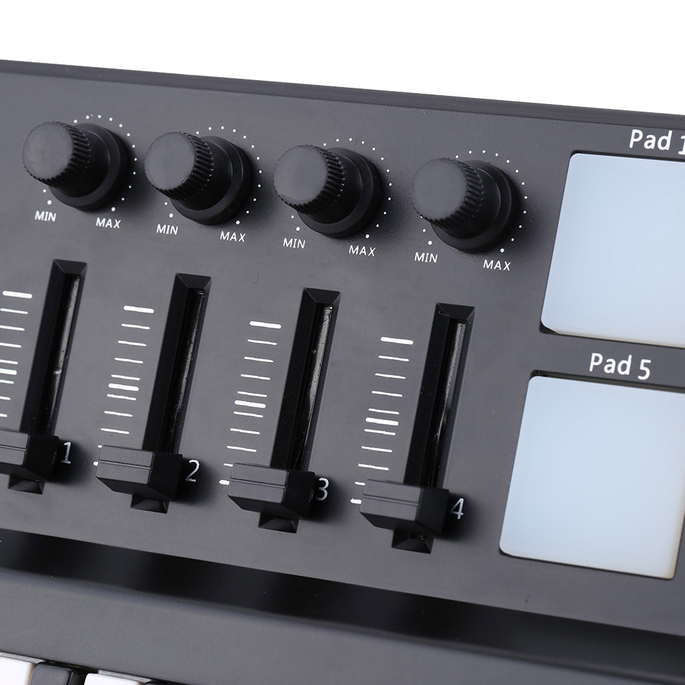 Portable USB Keyboard and Drum Pad MIDI Controller Portable USB Keyboard and Drum Pad MIDI Controller