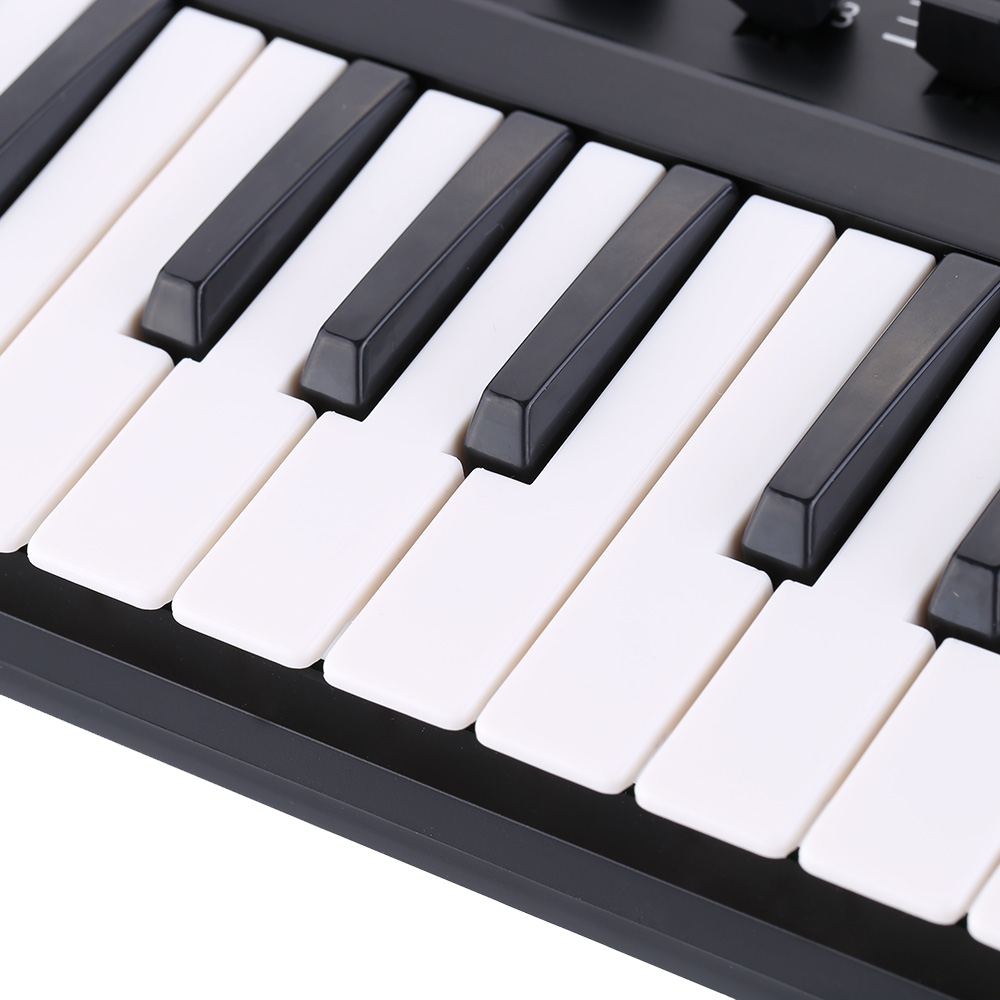 Portable USB Keyboard and Drum Pad MIDI Controller Portable USB Keyboard and Drum Pad MIDI Controller