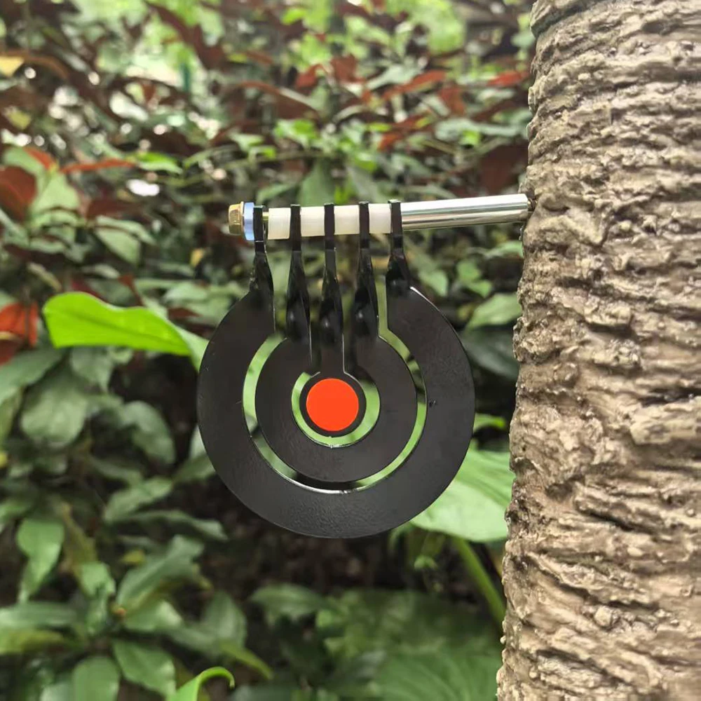 Shooting practice with a three – ring tree – inserted rotating pendulum target made of 3 – millimeter – thick metal
