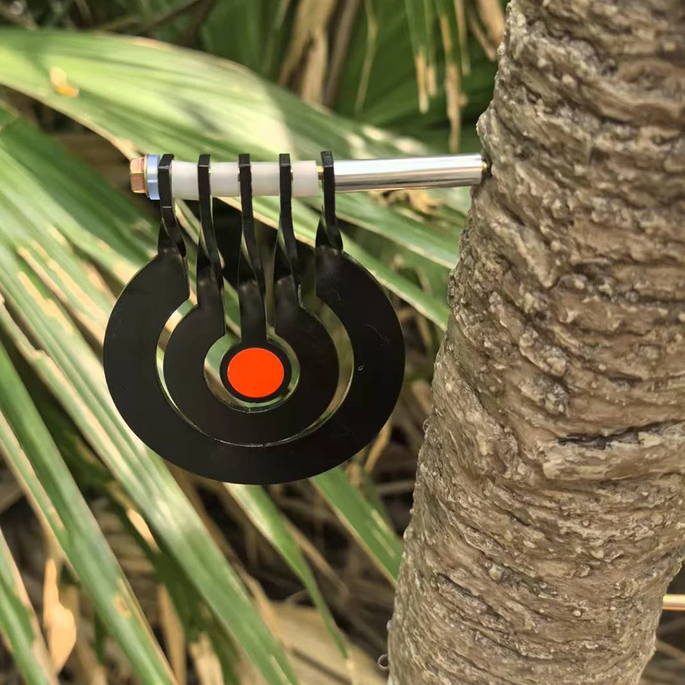 Shooting practice with a three – ring tree – inserted rotating pendulum target made of 3 – millimeter – thick metal