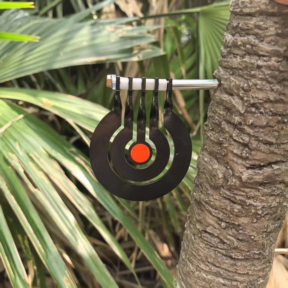 Shooting practice with a three – ring tree – inserted rotating pendulum target made of 3 – millimeter – thick metal