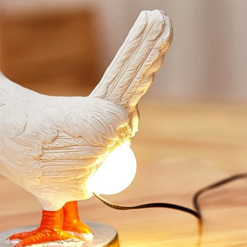 USB Night Lamp in The Design Of an Egg-Laying Hen with a Glowing Egg USB Night Lamp in The Design Of an Egg-Laying Hen with a Glowing Egg