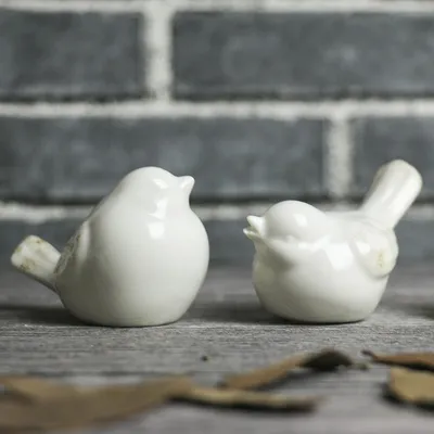 White Ceramic Bird Figurines (2pcs) White Ceramic Bird Figurines (2pcs)